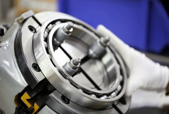 Quality control inspector testing a bearing